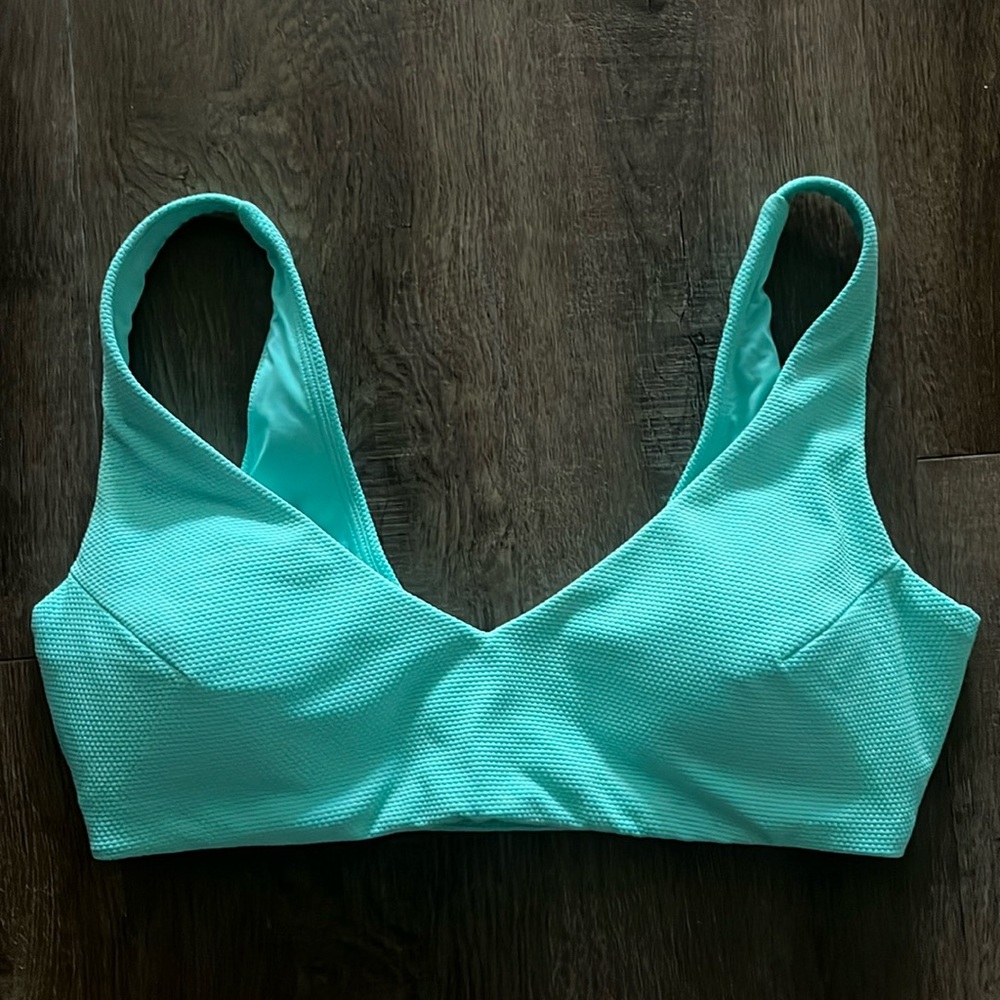 Pique plunge bikini top. Spanx. Never worn. Perfect condition
